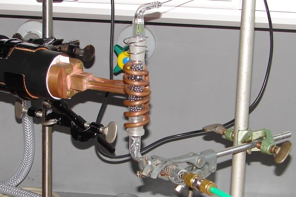 Indirect heating of gas via inductively heated metal balls