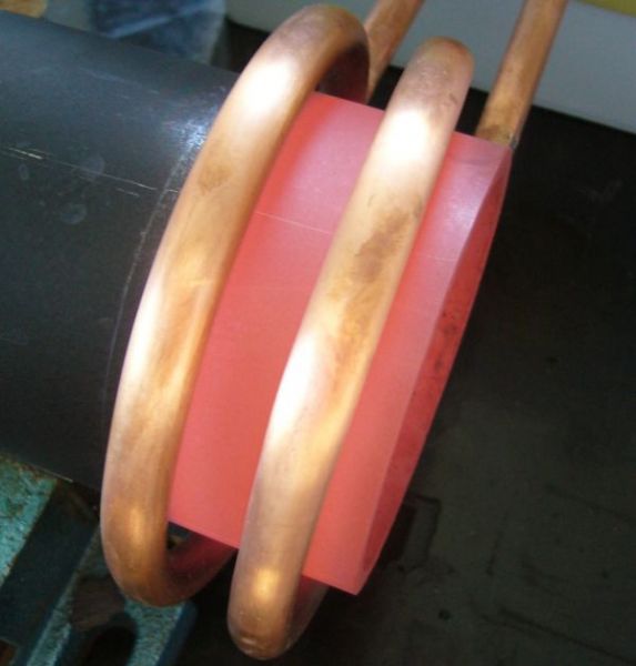 Continuous hardening of a tube