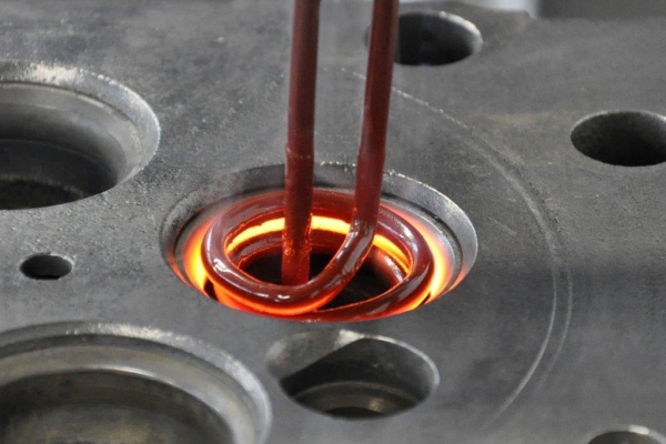 Inductive annealing of a valve seat